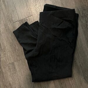 Dark charcoal grey pant with zipper ankle